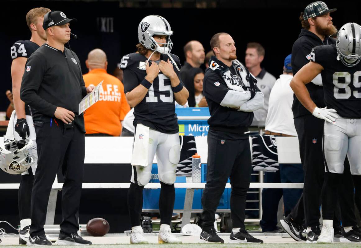 Raiders quarterback Gardner Minshew (15) watches the game from the sideline during an NFL footb ...