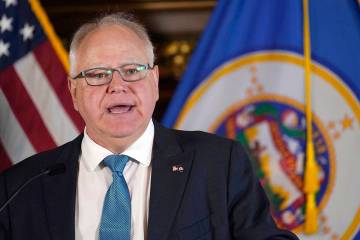 Tim Walz speaks to the media in St. Paul, Minn. (AP Photo/Abbie Parr, File)