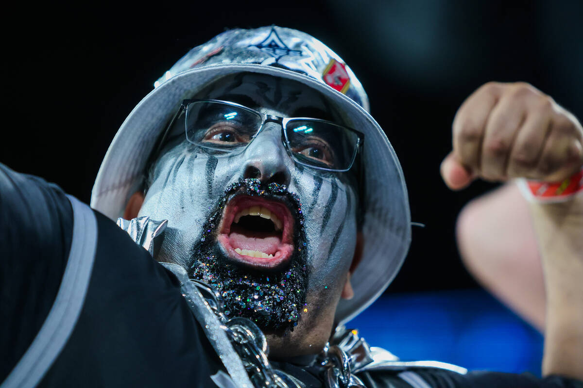 An Aces fan flexes for the flex cam during game one of a WNBA playoff game between the Aces and ...