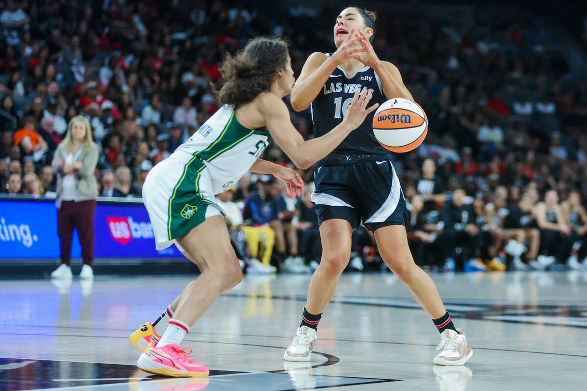 Seattle Storm guard Skylar Diggins-Smith (4) guards Aces guard Kelsey Plum (10) as she loses he ...