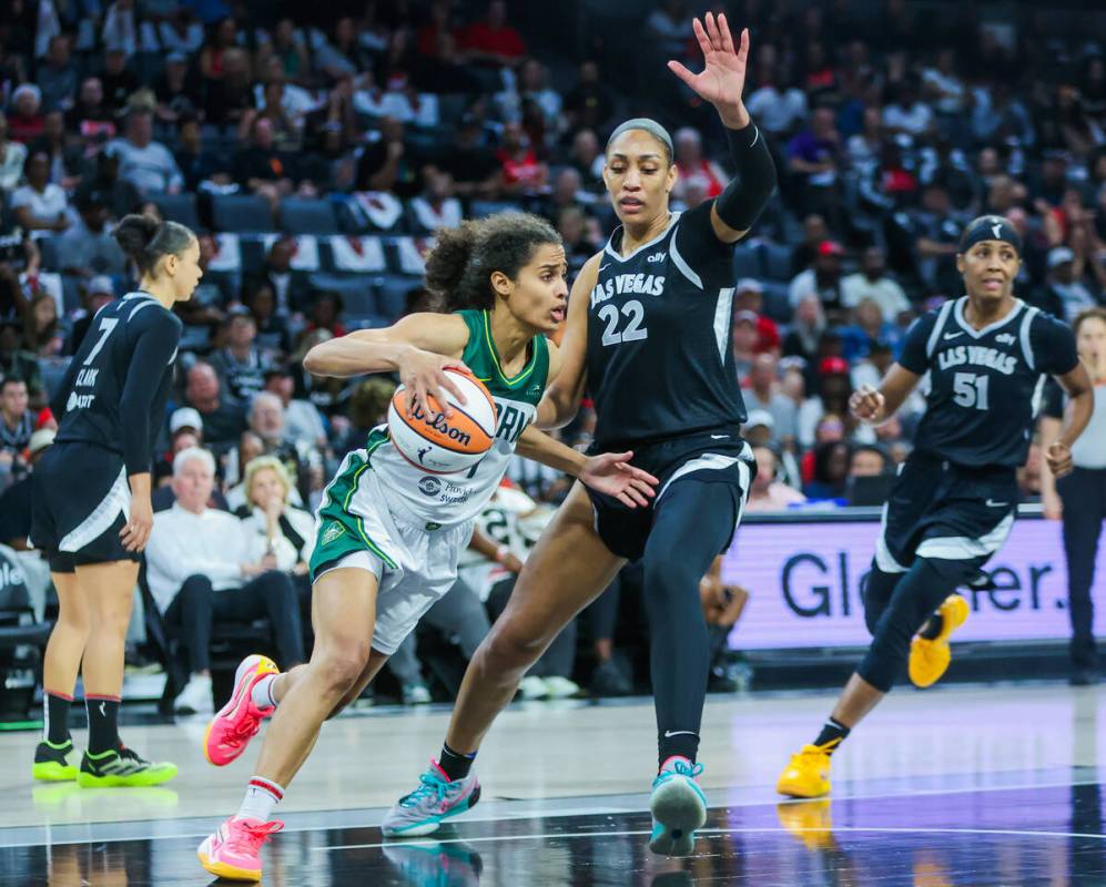 Aces center A'ja Wilson (22) guards Seattle Storm guard Skylar Diggins-Smith (4) during game on ...