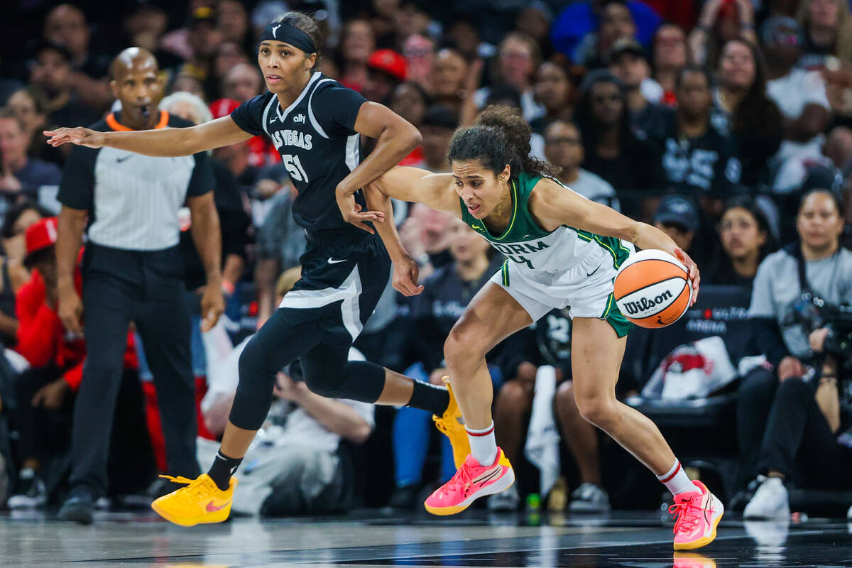 Aces guard Sydney Colson (51) guards Seattle Storm guard Skylar Diggins-Smith (4) as she runs t ...