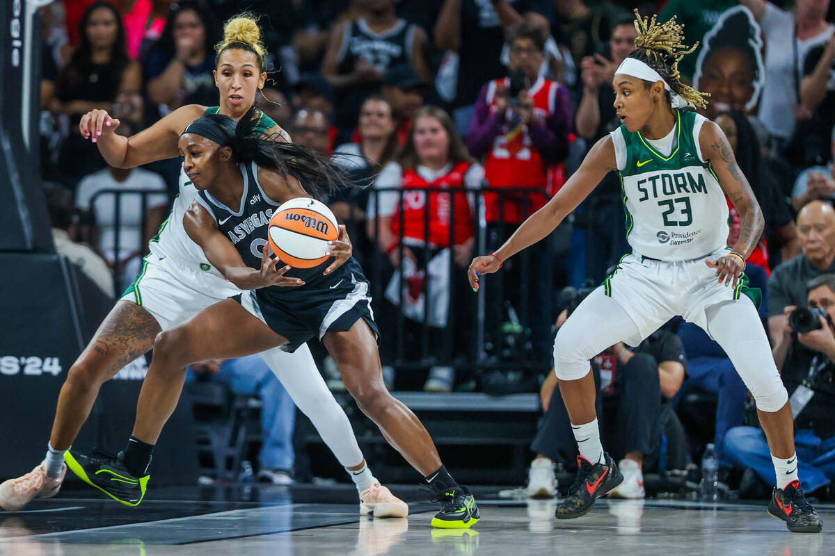 Aces guard Jackie Young (0) rushes the ball across the paint during game one of a WNBA playoff ...