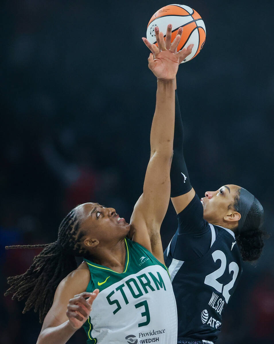 Aces center A'ja Wilson (22) and Seattle Storm forward Nneka Ogwumike (3) jump for the ball dur ...