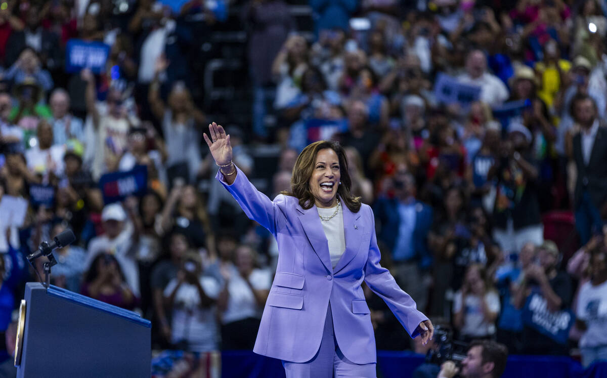 Vice President Kamala Harris greets supporters as she takes the stage during a campaign rally a ...