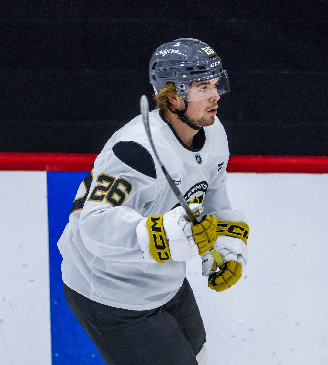 Golden Knights forward Alexander Holtz (26) reacts to a drill during training camp at City Nati ...