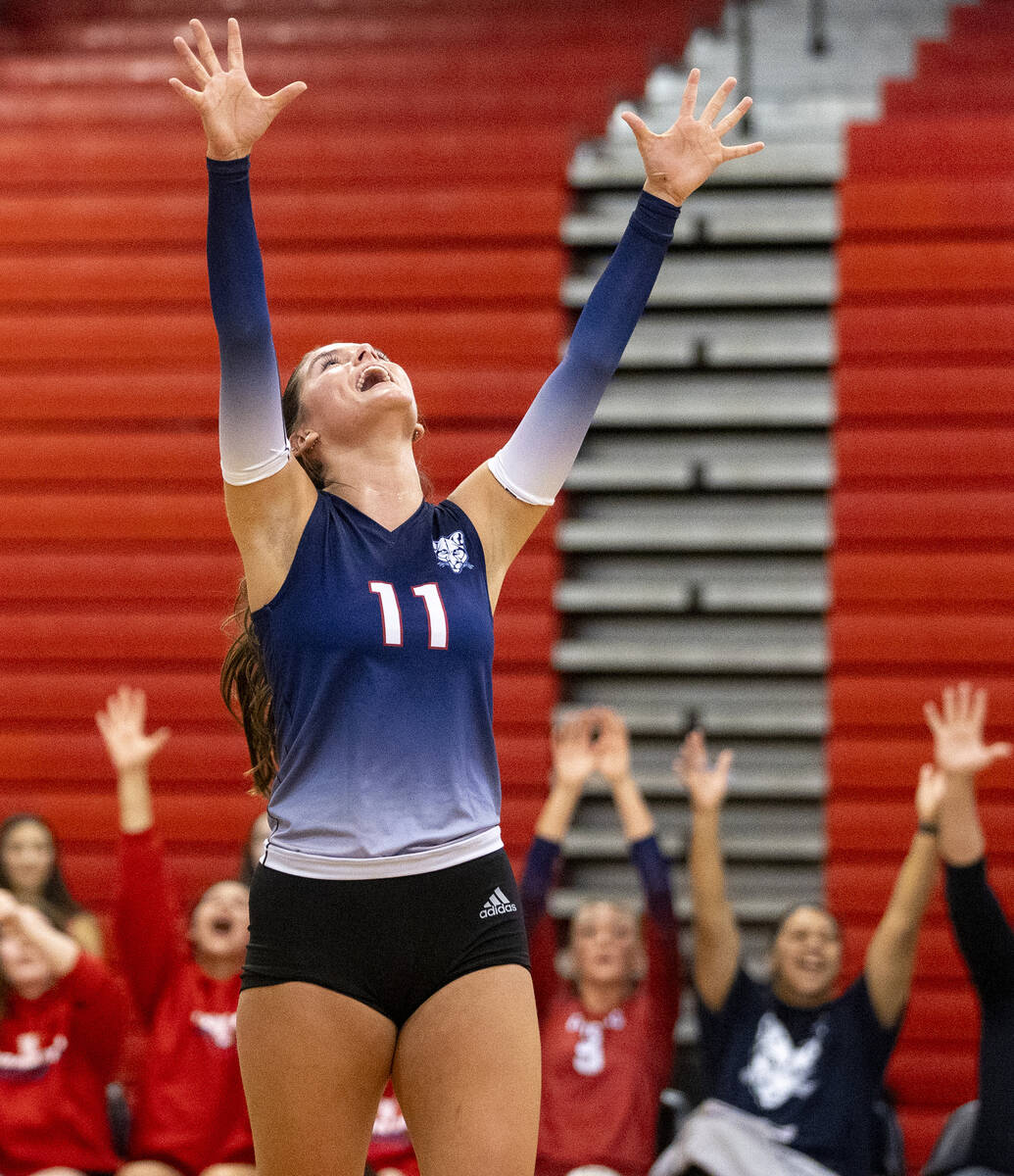 Coronado senior Reagan Vint (11) celebrates a point during the high school volleyball game agai ...