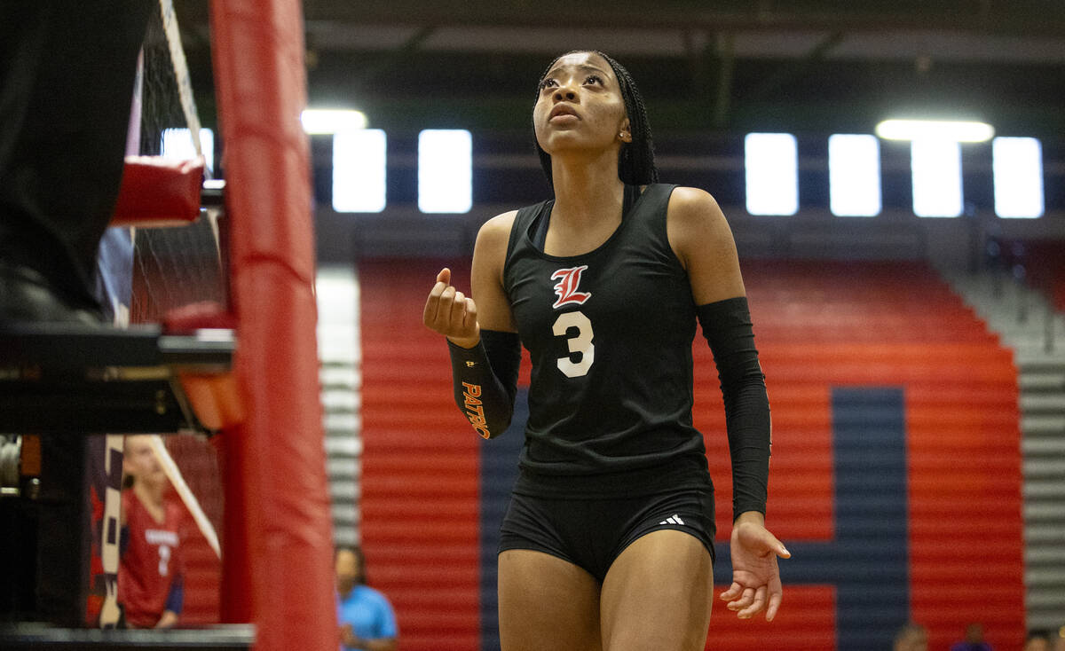 Liberty senior Kennedy Cooper (3) pleads her case to a referee after a point was given to Coron ...