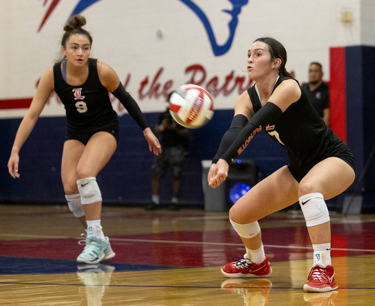 Liberty junior Mahana Conner (7) competes during the high school volleyball game against Corona ...