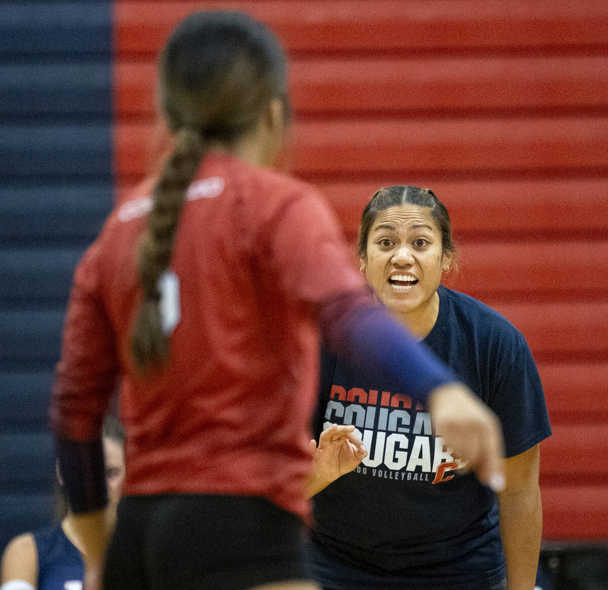 Coronado Head Coach Melody Nua talks to her players during the high school volleyball game agai ...