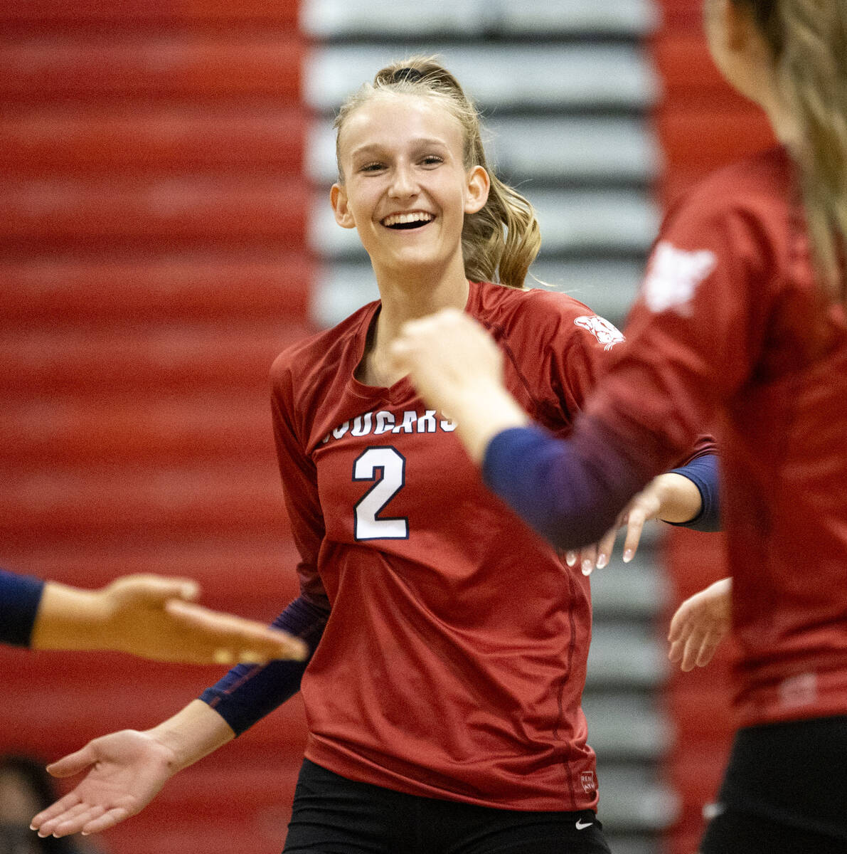 Coronado junior Julie Beckham (2) celebrates a point during the high school volleyball game aga ...