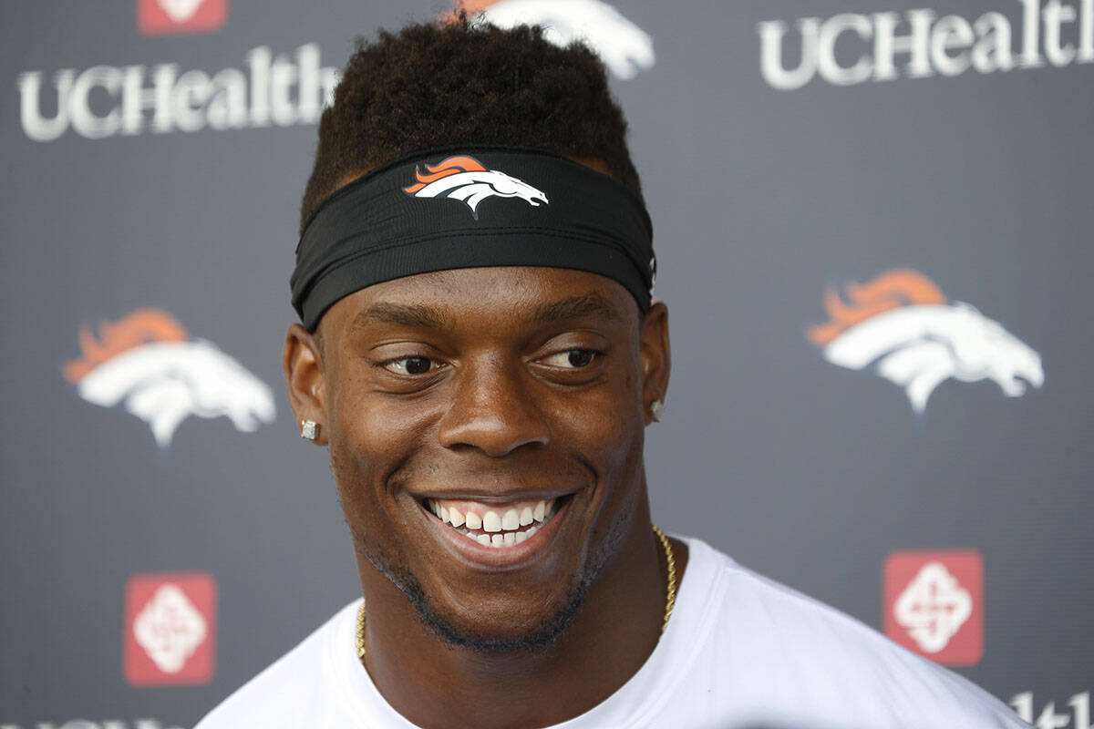 Denver Broncos outside linebacker Brandon Marshall jokes with reporters after drills at the tea ...