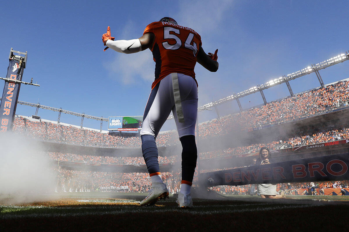 Denver Broncos inside linebacker Brandon Marshall is introduced during the first half in a NFL ...