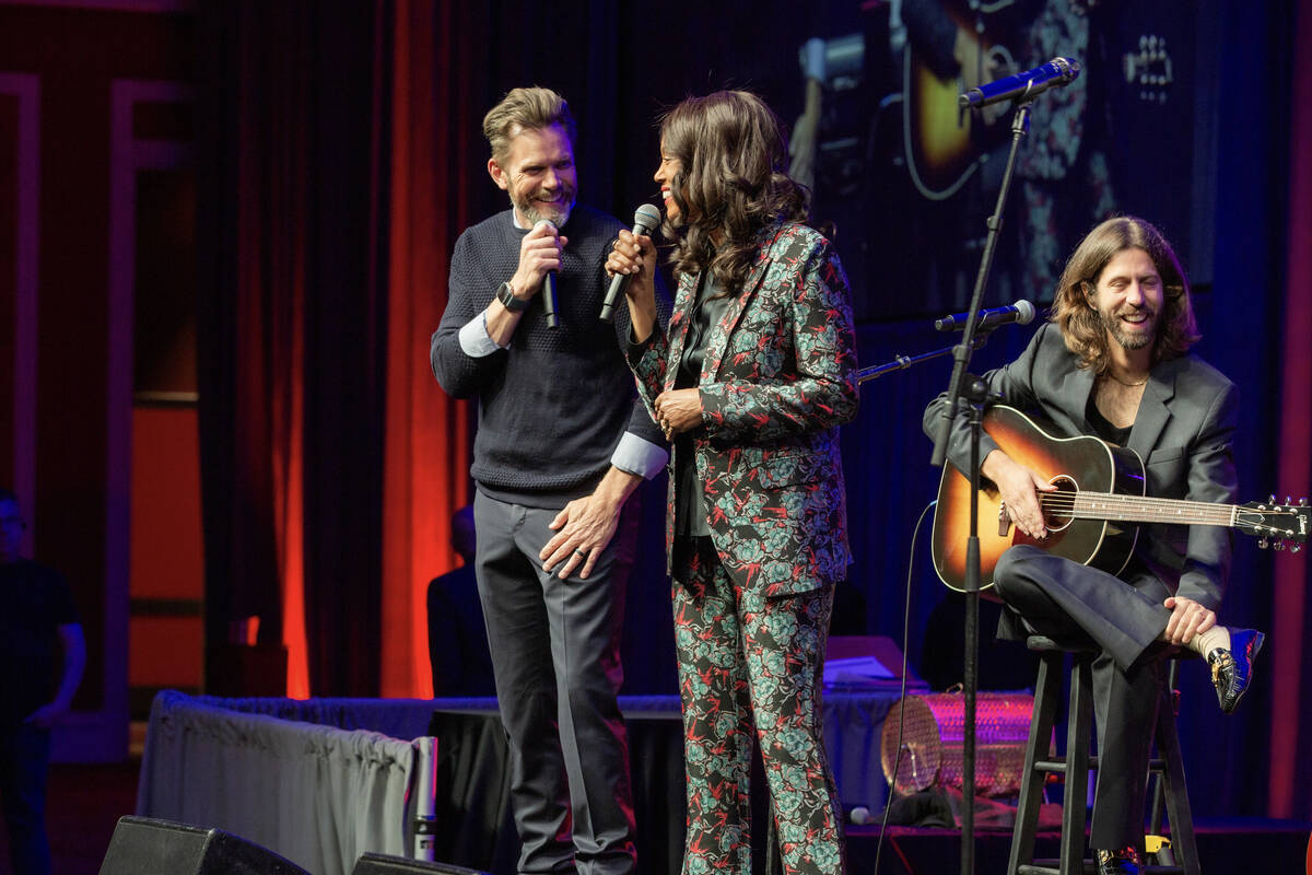 Joel McHale and co-host Aisha Tyler are shown at the 2024 Rise Up Gala, benefitting Tyler Robin ...