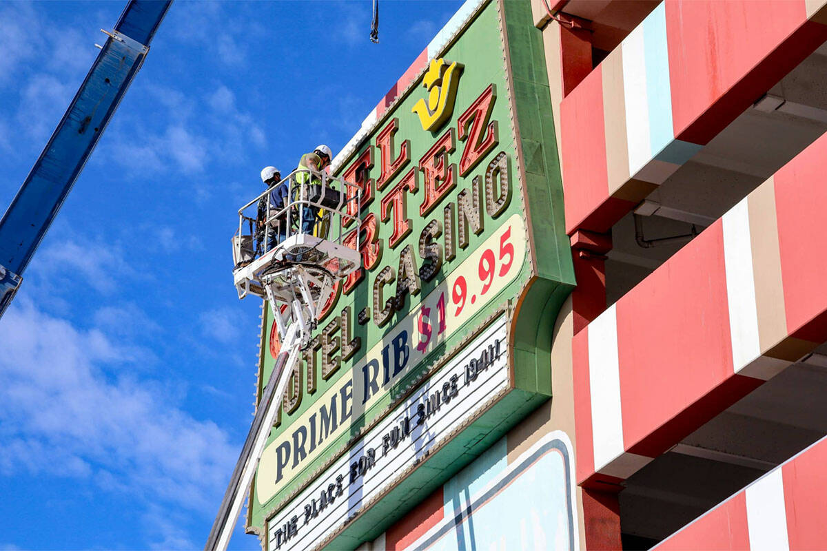 Crews move the El Cortez's "Prime Rib $19.95" sign to the Neon Museum. (Neon Museum)