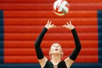 Liberty sophomore Addison Jones (14) competes during the high school volleyball game against Co ...