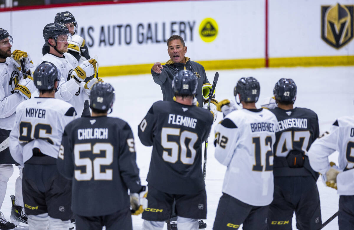 Golden Knights Head Coach Bruce Cassidy speaks to his players on the ice during the first day o ...