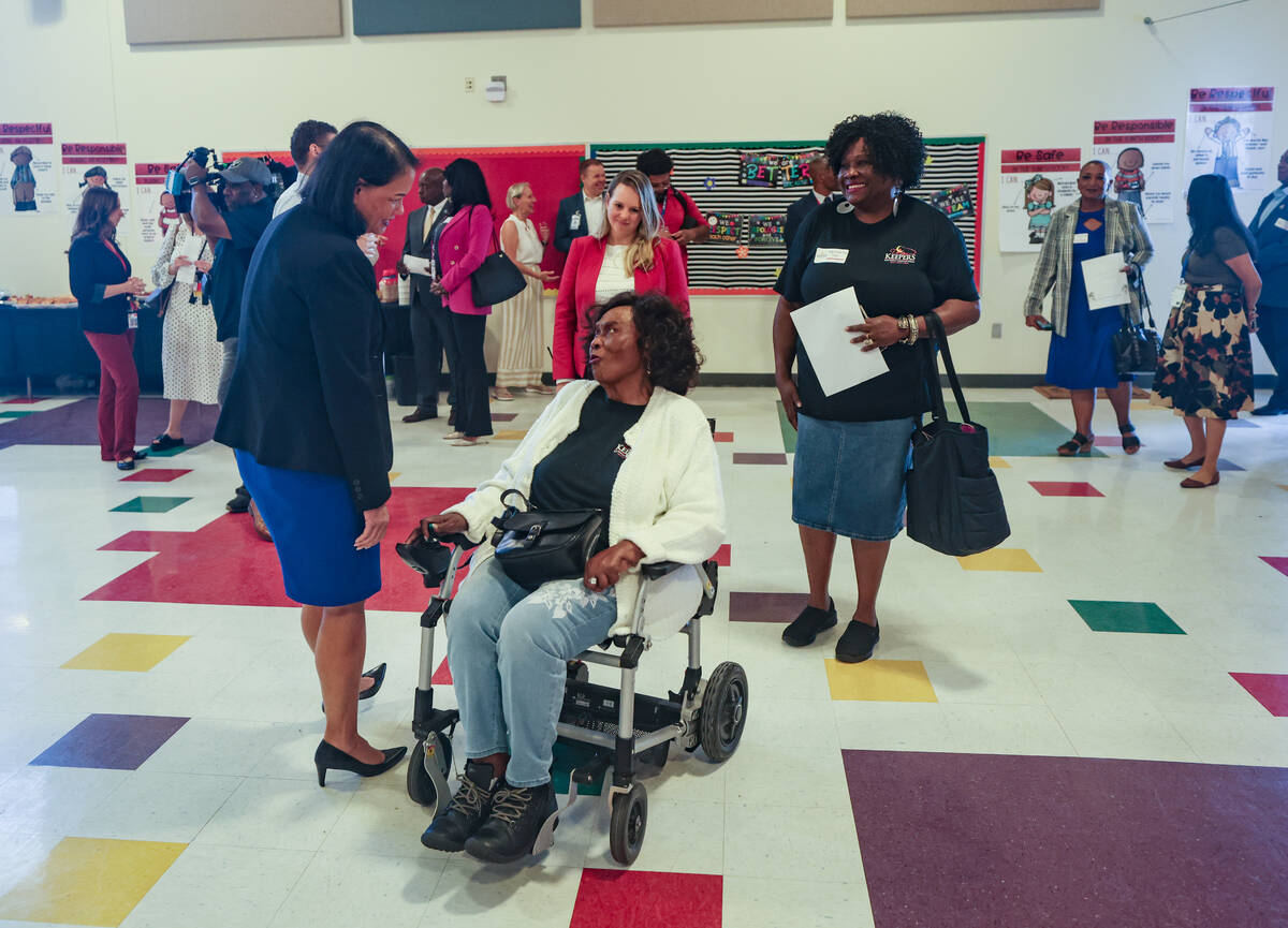 Superintendent of Public Instruction Jhone Ebert greets Ruby Duncan, an activist for welfa ...