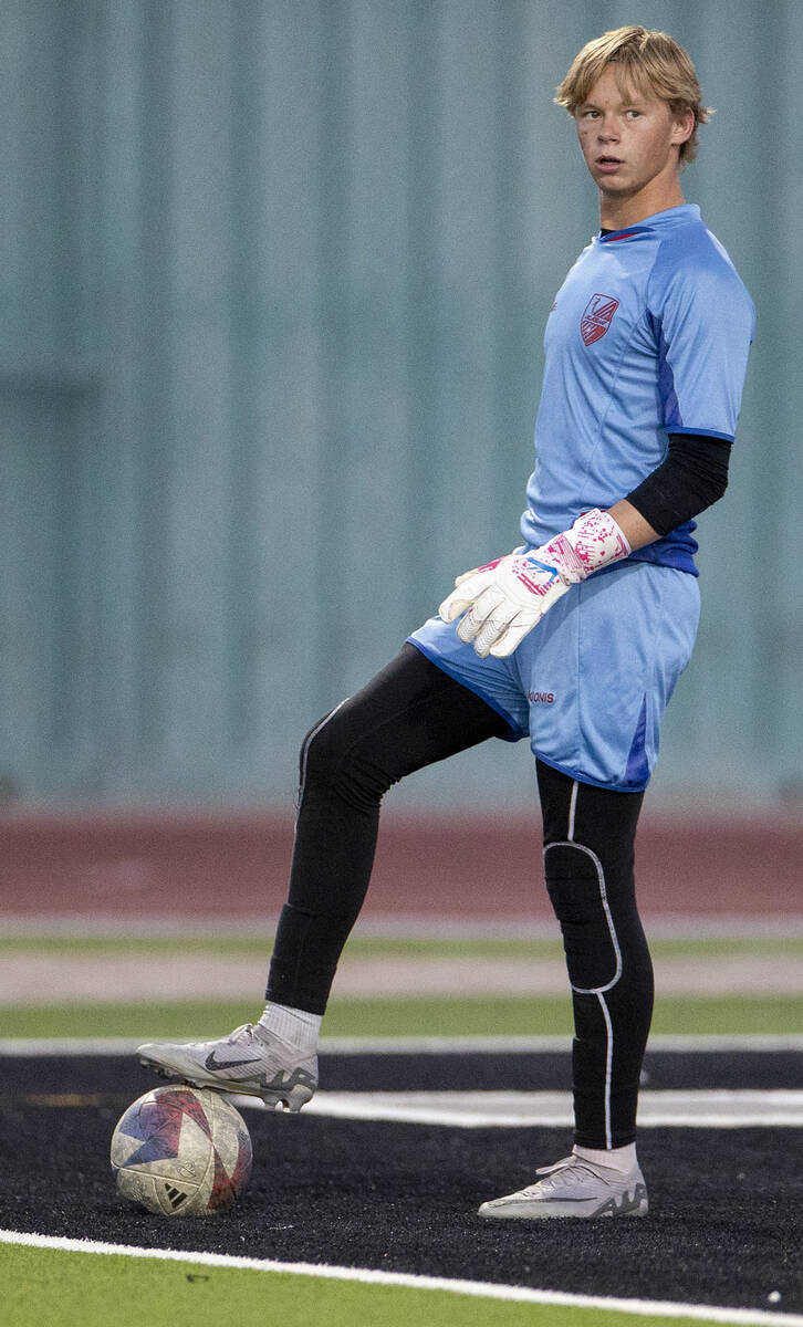 Palo Verde goalkeeper Landon Blanchard (1) controls the ball during the high school soccer game ...