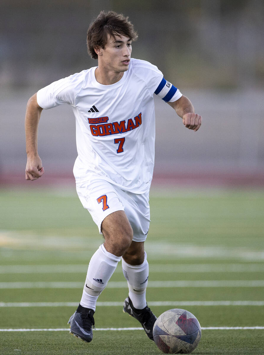 Bishop Gorman midfielder Maddix Bordinhao (7) runs with the ball during the high school soccer ...