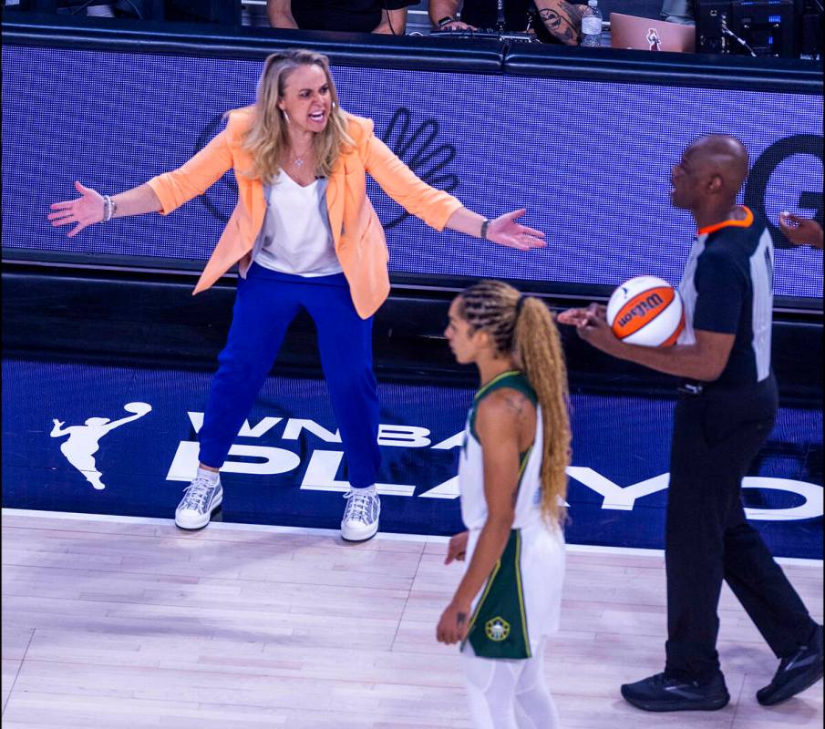 Aces Head Coach Becky Hammon argues for a foul call against the Seattle Storm during the second ...