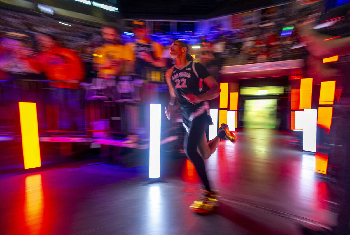 Aces center A'ja Wilson (22) takes the court while being announced to face the Seattle Storm du ...