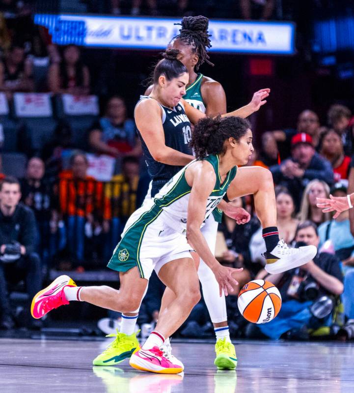 Seattle Storm guard Skylar Diggins-Smith (4) rolls past Aces guard Kelsey Plum (10) who gets pi ...