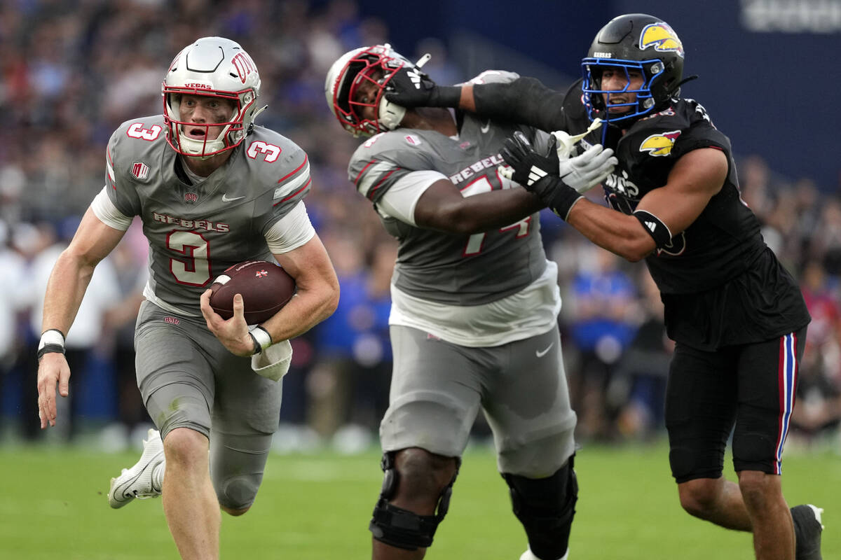 UNLV quarterback Matthew Sluka (3) runs with the ball against Kansas on Friday, Sept. 13, 2024, ...