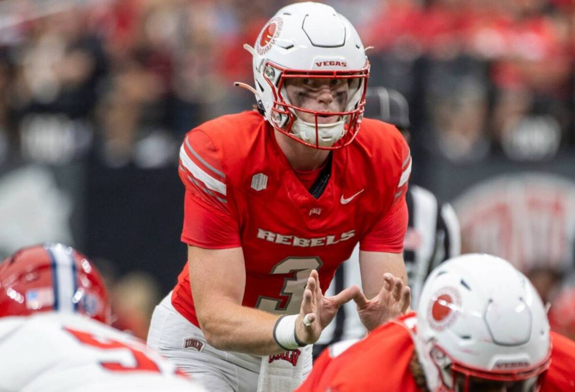 UNLV quarterback Matthew Sluka (3) prepares to snap the ball during the college football game a ...