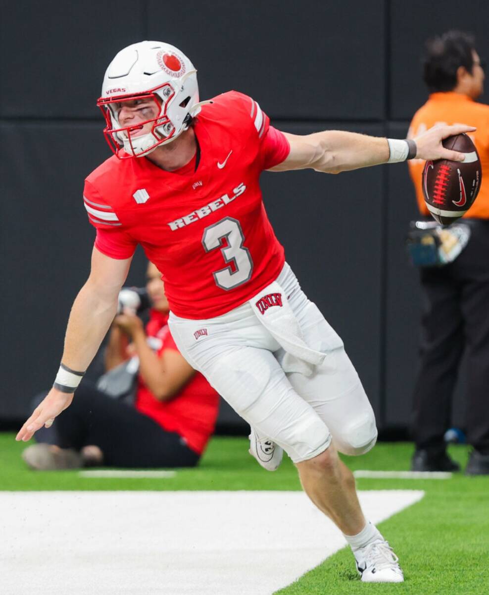 UNLV quarterback Matthew Sluka (3) celebrates a touchdown during an NCAA football game between ...