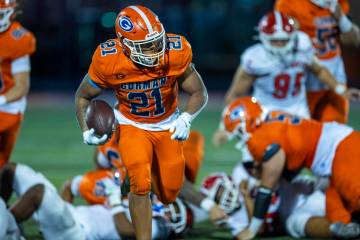 Bishop Gorman running back Jonathan Coar (21) sprints toward the end zone against Orange Luther ...