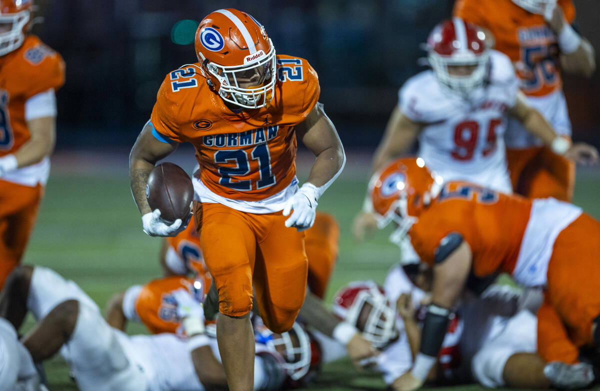 Bishop Gorman running back Jonathan Coar (21) sprints toward the end zone against Orange Luther ...