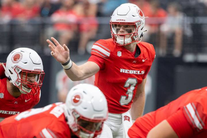 UNLV quarterback Matthew Sluka (3) directs the offensive line during the college football game ...