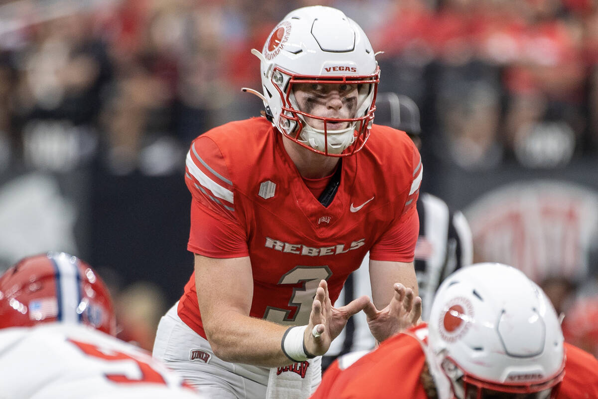 UNLV quarterback Matthew Sluka (3) prepares to snap the ball during the college football game a ...