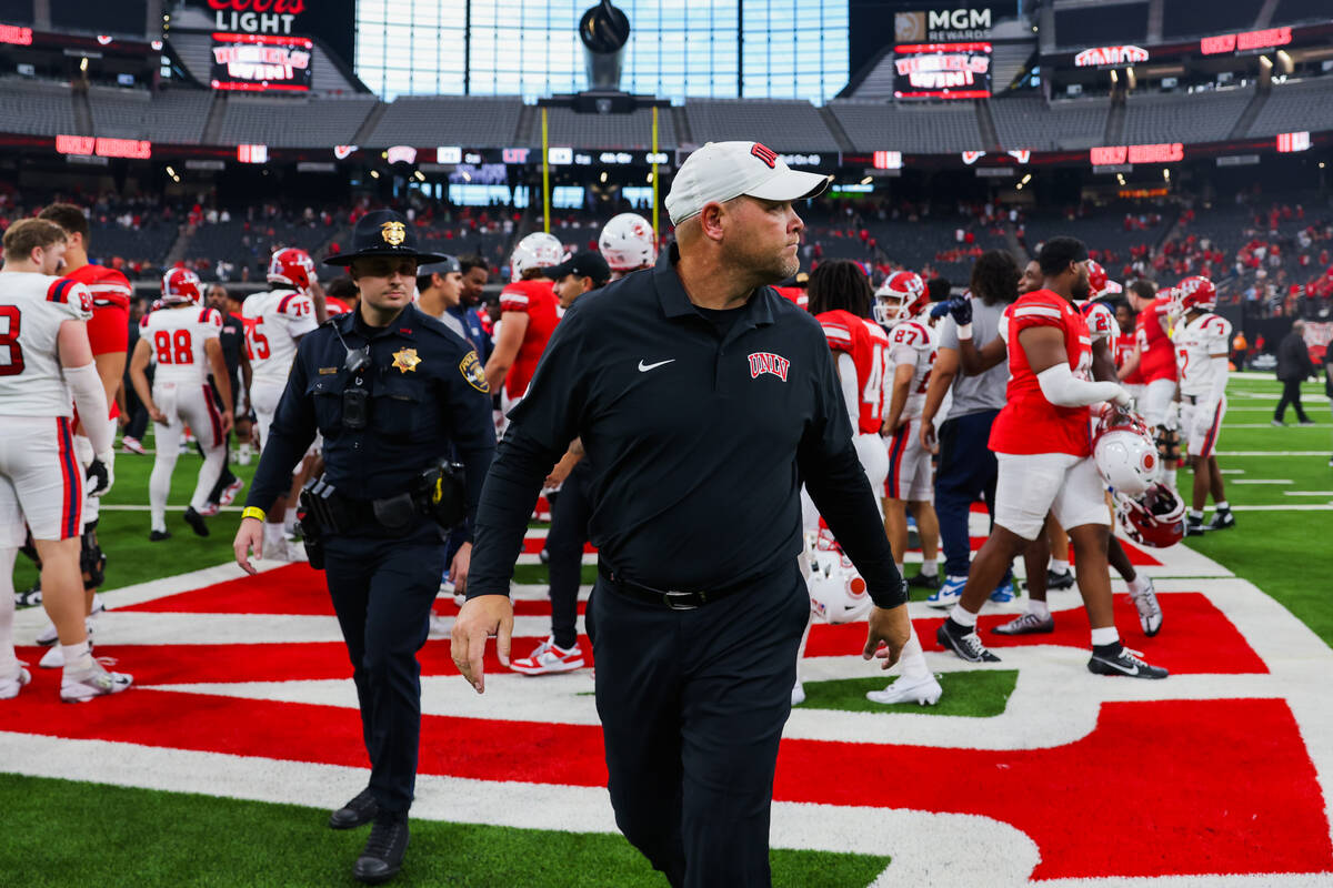 UNLV head coach Barry Odom exits the field following a 72-14 win over Utah Tech at Allegiant St ...