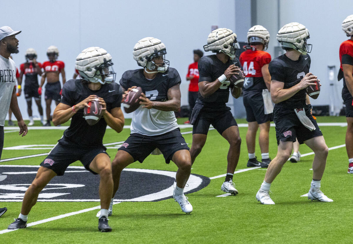 (LtoR) UNLV quarterbacksGael Ochoa (14), Cameron Friel (7), Hajj-Malik Williams (6) and Matthew ...