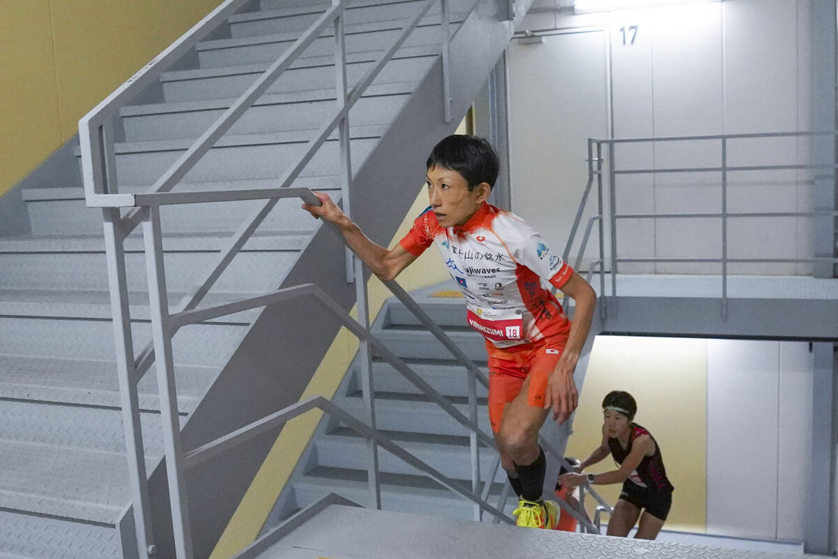 In this photo provided by ISF/Meeting, runner Yuri Yoshizumi competes during a race of Staircli ...