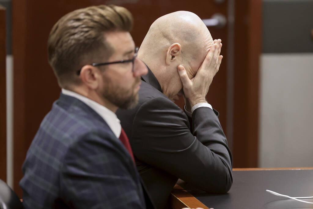 Robert Telles reacts as his wife Mary Ann Ismael talks on the witness stand during the penalty ...