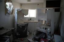 A damaged house that was hit by a rocket fired from Lebanon, near Safed, northern Israel, on We ...