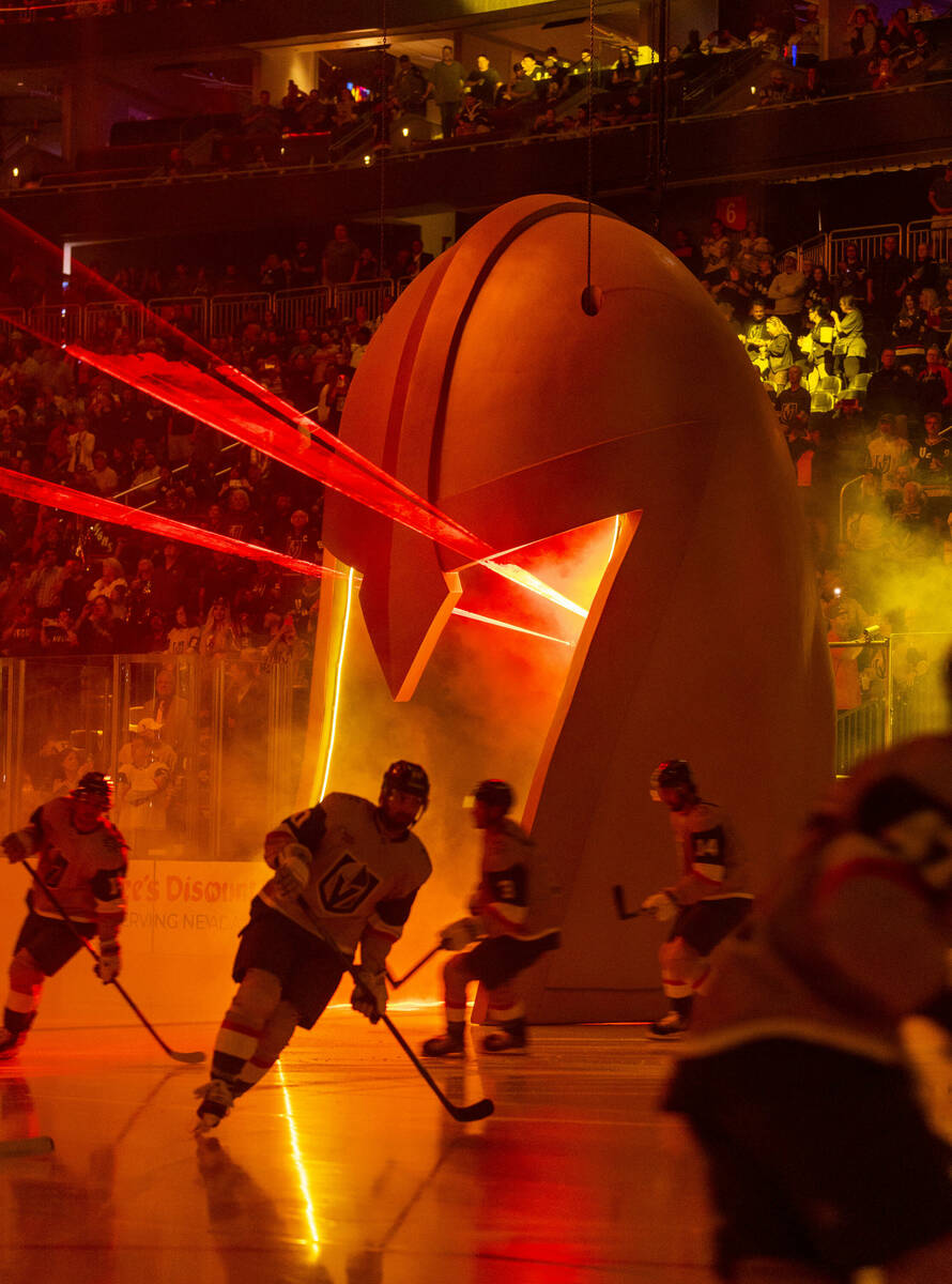 Golden Knights players take the ice through the giant helmet at face the Los Angeles Kings befo ...