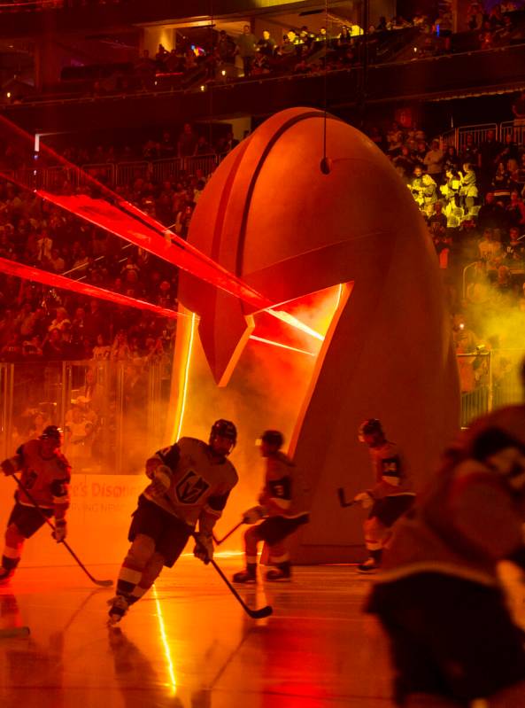 Golden Knights players take the ice through the giant helmet at face the Los Angeles Kings befo ...