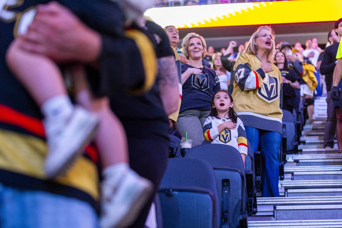 Fans yell "knight" during g the National Anthem as the Golden Knights and Los Angeles ...