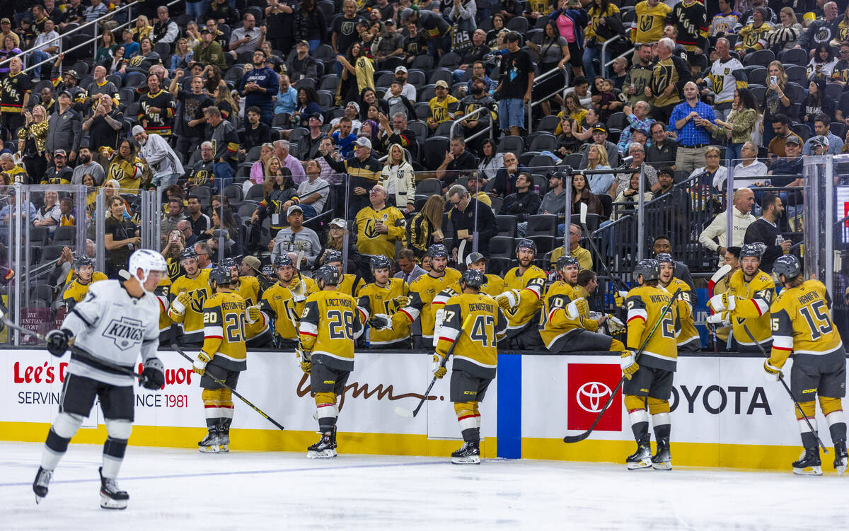 Golden Knights players celebrate the first goal against the Los Angeles Kings during the secon ...