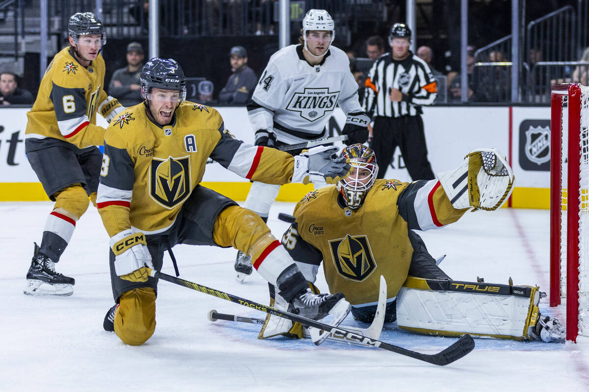 Golden Knights defenseman Brayden McNabb (3) and goaltender Ilya Samsonov (35) watch a shot hea ...