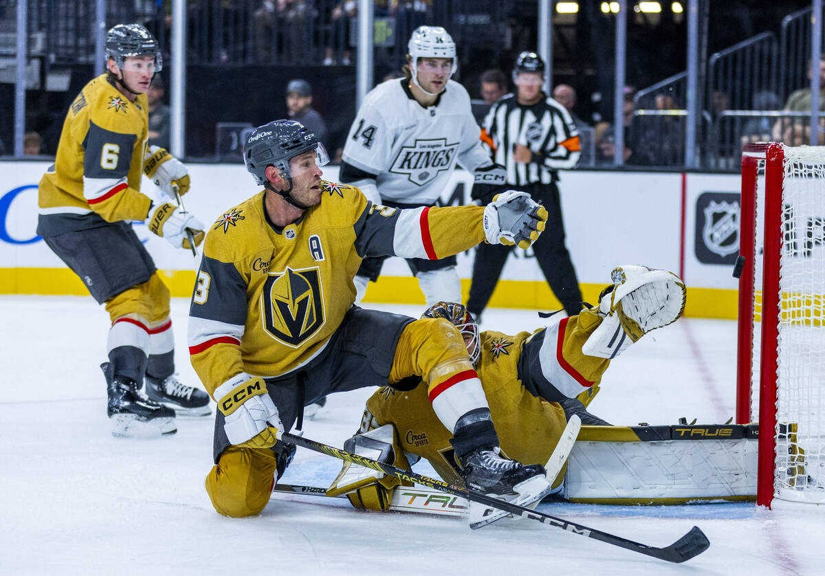 Golden Knights defenseman Brayden McNabb (3) and goaltender Ilya Samsonov (35) watch a shot hea ...