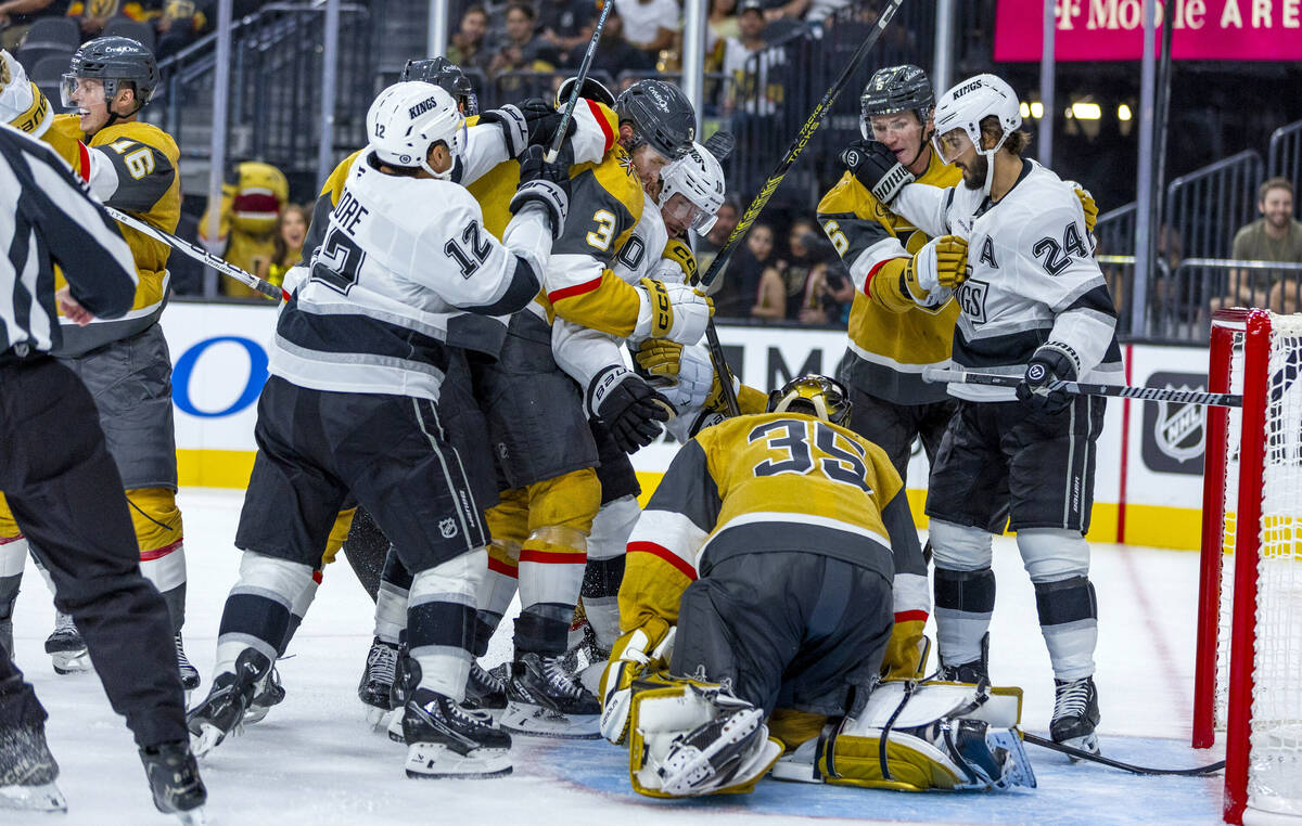 Golden Knights and Los Angeles Kings players scrap as Golden Knights goaltender Ilya Samsonov ( ...