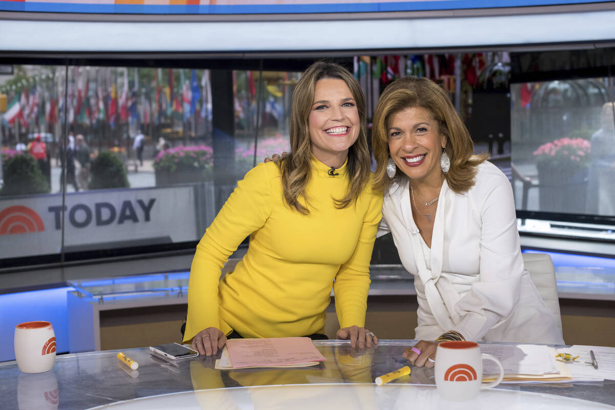 Co-anchors Savannah Guthrie, left, and Hoda Kotb pose on set of the "Today" show at NBC Studios ...