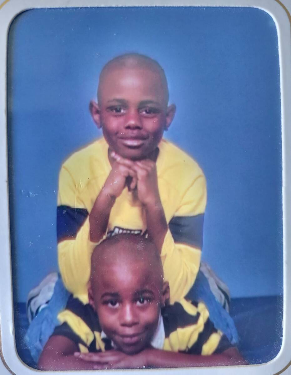 Brothers Weslie Martin (top) and Denzel Martin (bottom) when they were younger. (Courtesy)