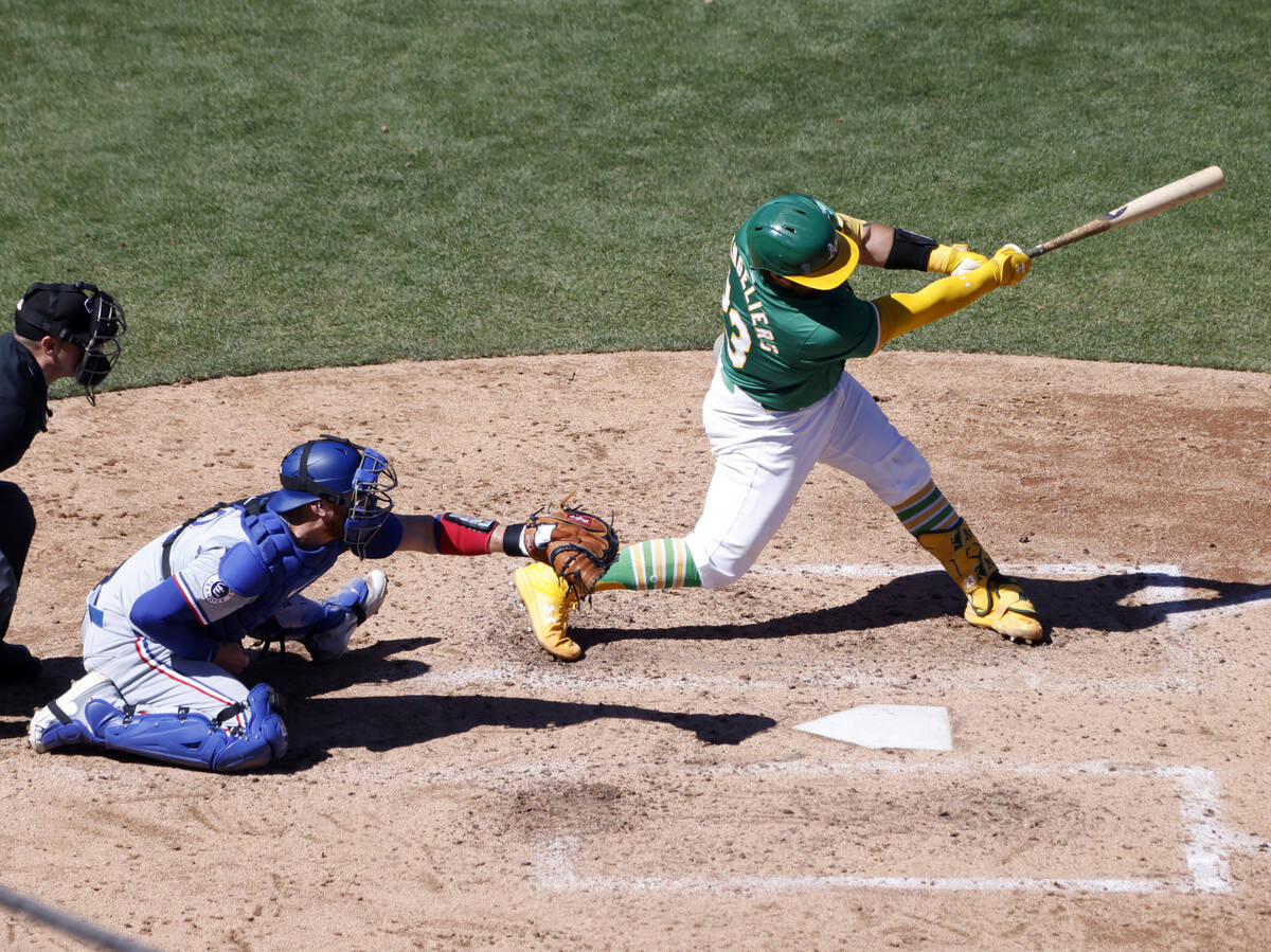 Oakland Athletics centerfield Shea Langeliers swings during final home game against the Texas R ...