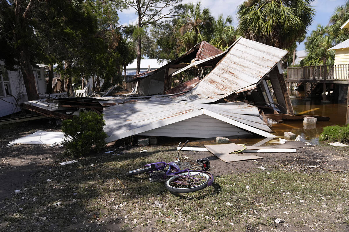 A destroyed home is seen in the aftermath of Hurricane Helene, in Cedar Key, Fla., Friday, Sept ...